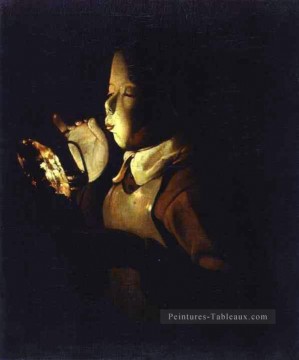 Garçon soufflant à la lampe ABC chandelles Georges de La Tour Peinture à l'huile